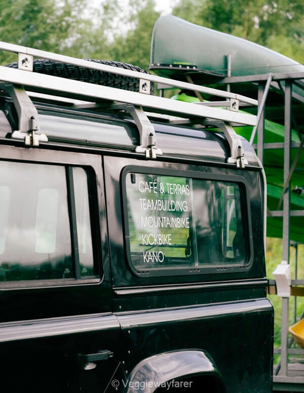 Kayaks stacked on a Land Rover at The Shelter in Korbeek-Dijle, where the Dijle kayak trips start