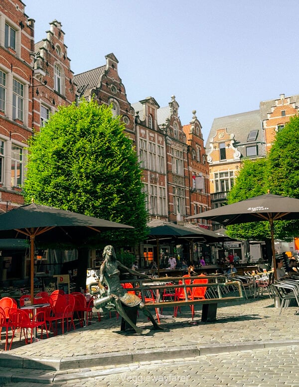 Café terraces beneath the stepped gabled houses of the Oude Markt in Leuven
