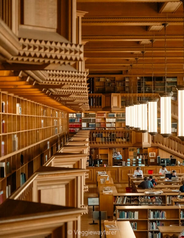 Wooden bookcases and galleries above the reading room of the Leuven University Library