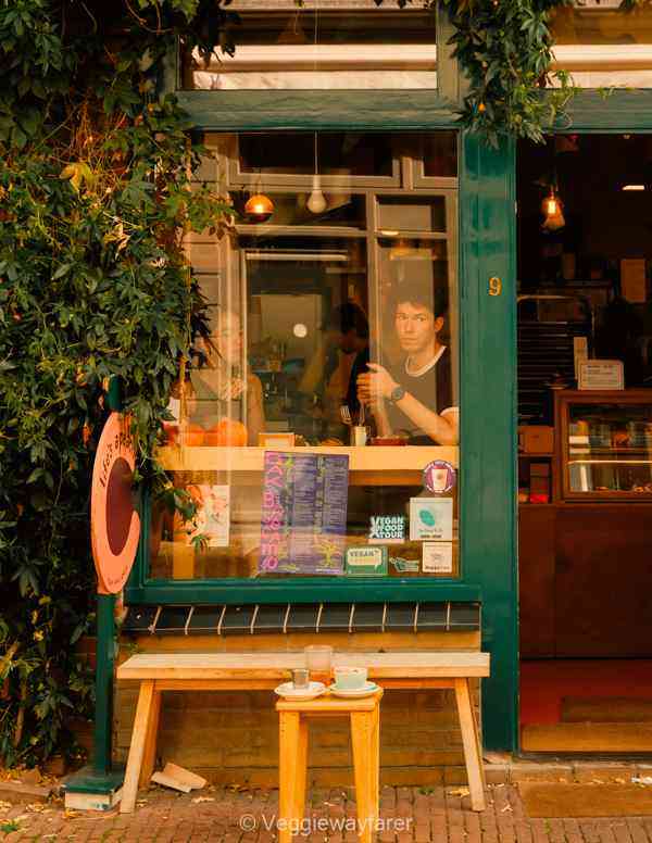 Couple drinking coffee in a bar in utrecht
