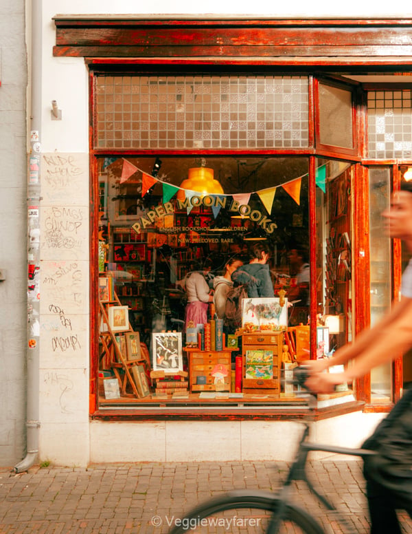 PaperMoon Books in Utrecht Netherlands with a cyclist coming by