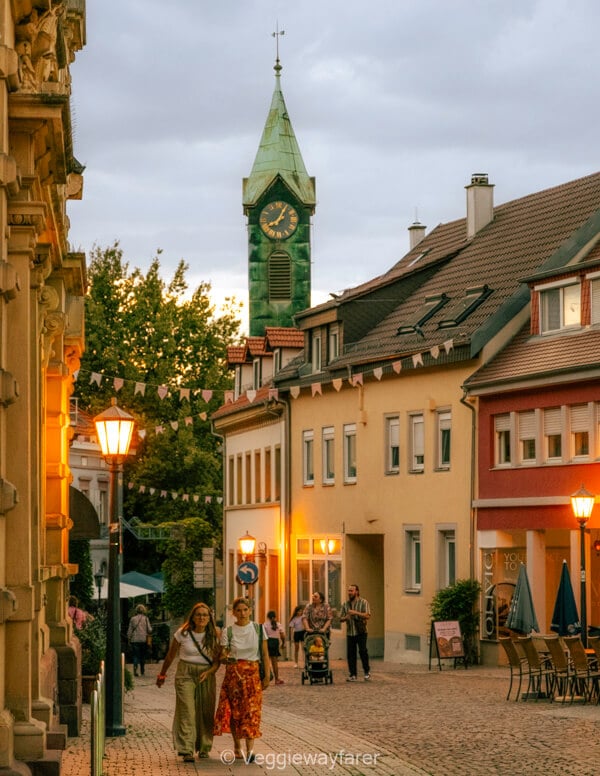 Historic old town street and church tower in Bretten at dusk