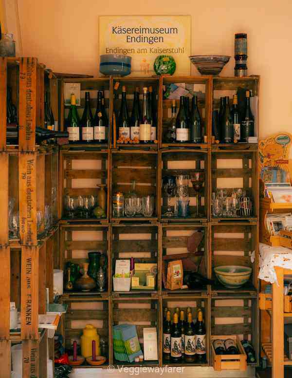 Bottles of wine and books in the cheese museum in Endingen