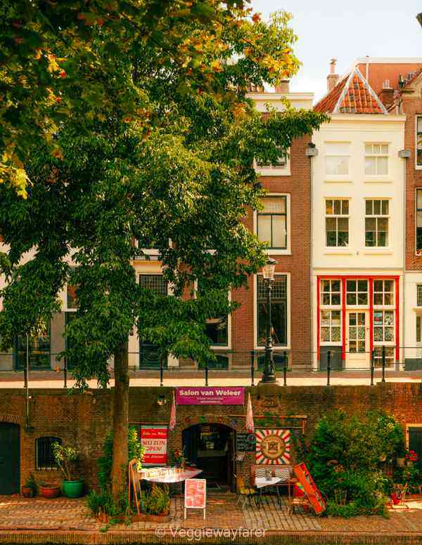 Oudegracht canal in Utrecht, little shop on the lower warf